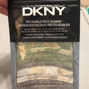 DKNY 5 pack face masks multi designs. Adjustable ear loops/nose piece. NWT